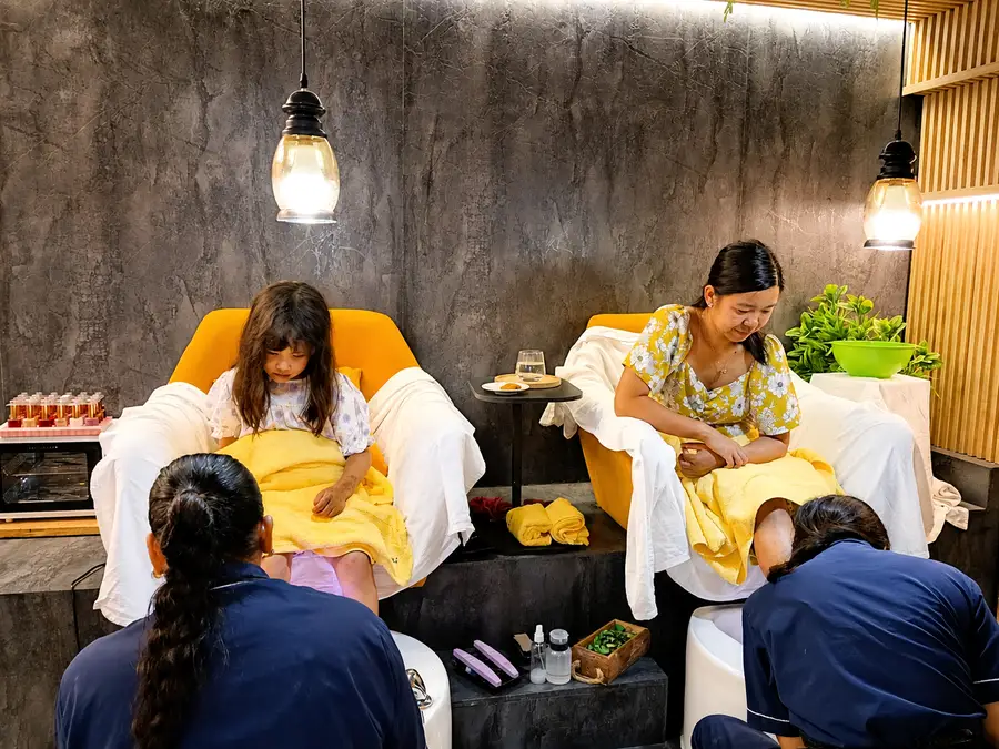 Customers receiving pedicure treatments at Subina’s Nails Palace & Beauty Salon in Jhamsikhel