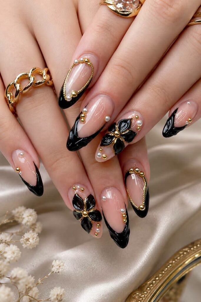 Black and gold nail art manicure at a nail salon in Jhamsikhel, Lalitpur